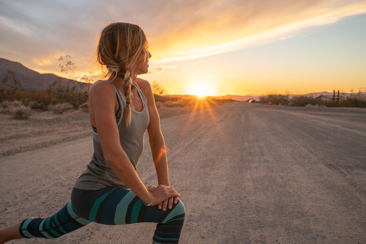 woman-stretching-for-running-with-dog